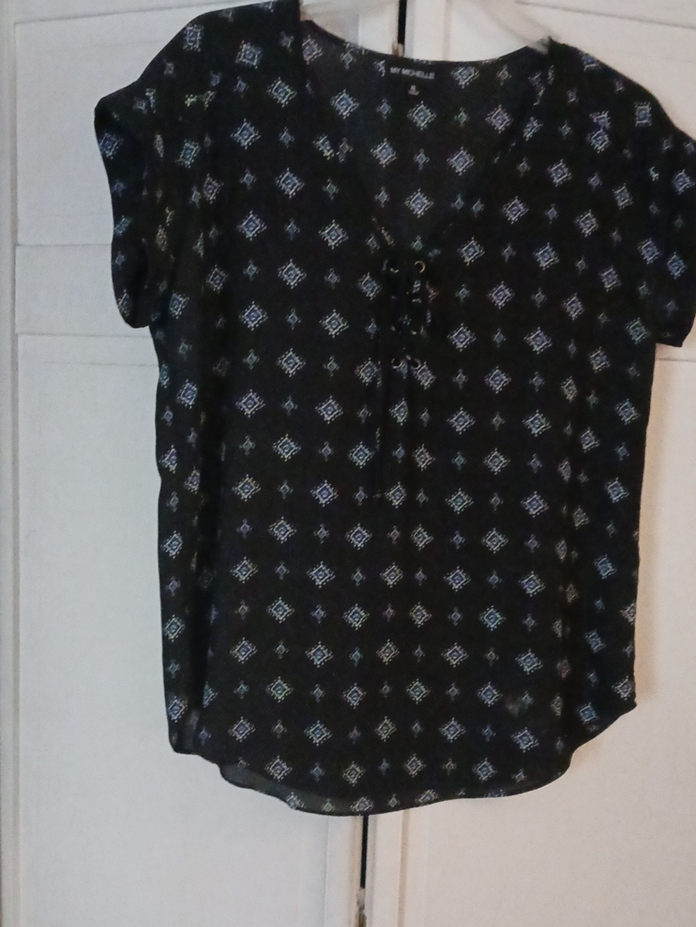 Michele Black Geometric Lace-Up Blouse